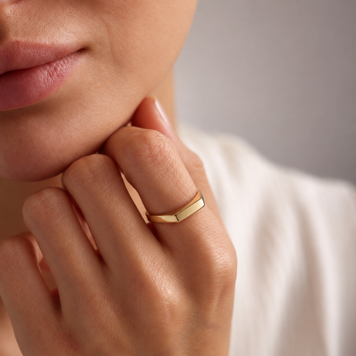 elle signet ring — editorial photograph, exact catalogue design
