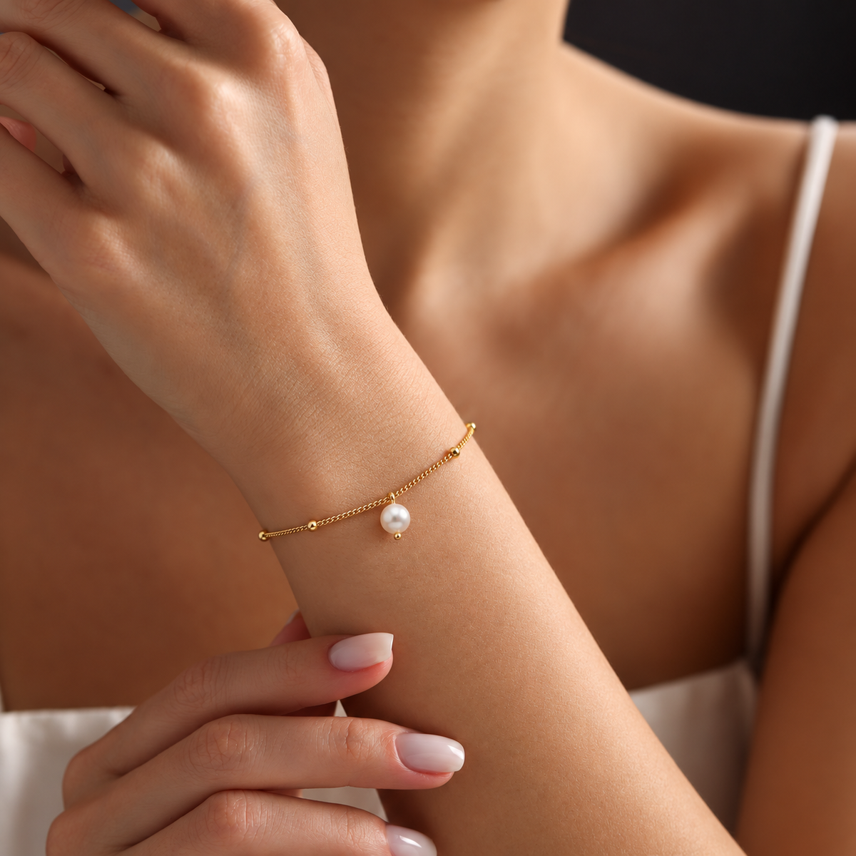 nora pearl bracelet — editorial photograph, exact catalogue design