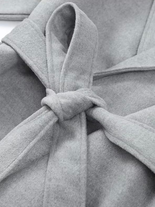 Céline | Manteau ceinturé à poignets en fausse fourrure