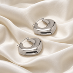 elle triangle hoops satin — campaign product photograph