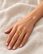 lia crescent ring worn covered — campaign product photograph