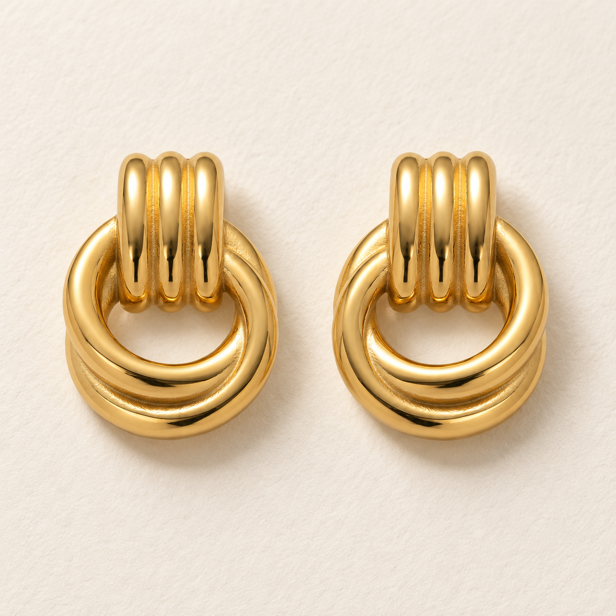 lia intertwined earrings macro — edited campaign photograph