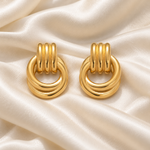 lia intertwined earrings satin — edited campaign photograph
