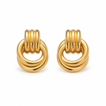 lia intertwined earrings studio — edited campaign photograph