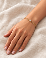 lumi layered bracelet worn covered — campaign product photograph
