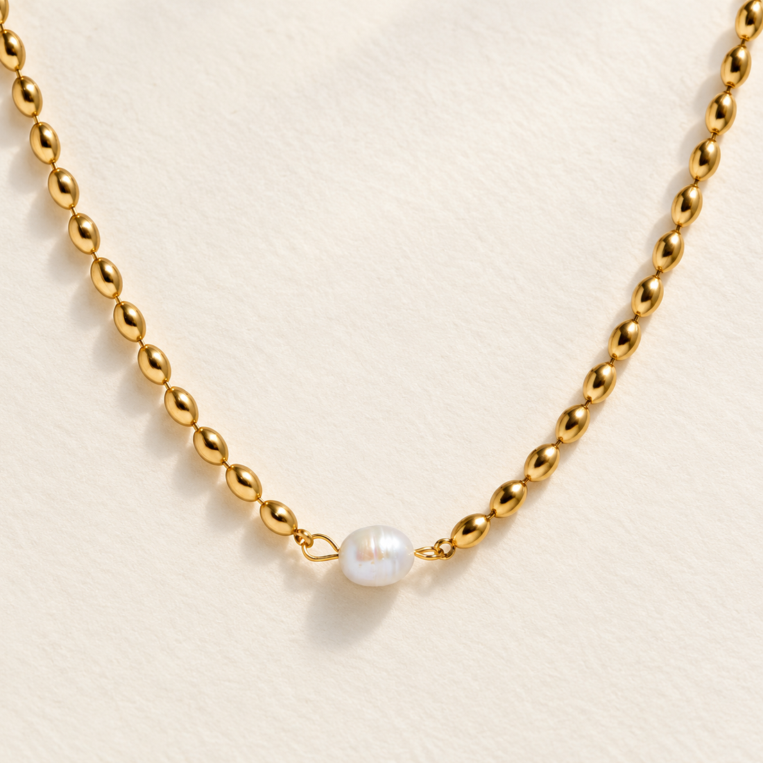 nora pearl necklace macro — campaign product photograph