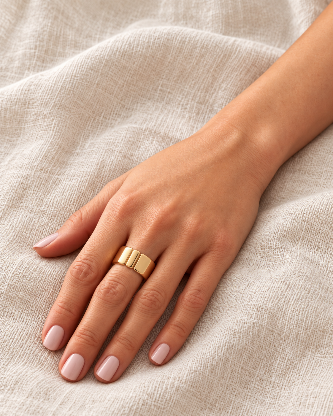 onde cuff ring worn covered — campaign product photograph