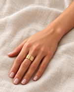onde cuff ring worn covered — campaign product photograph