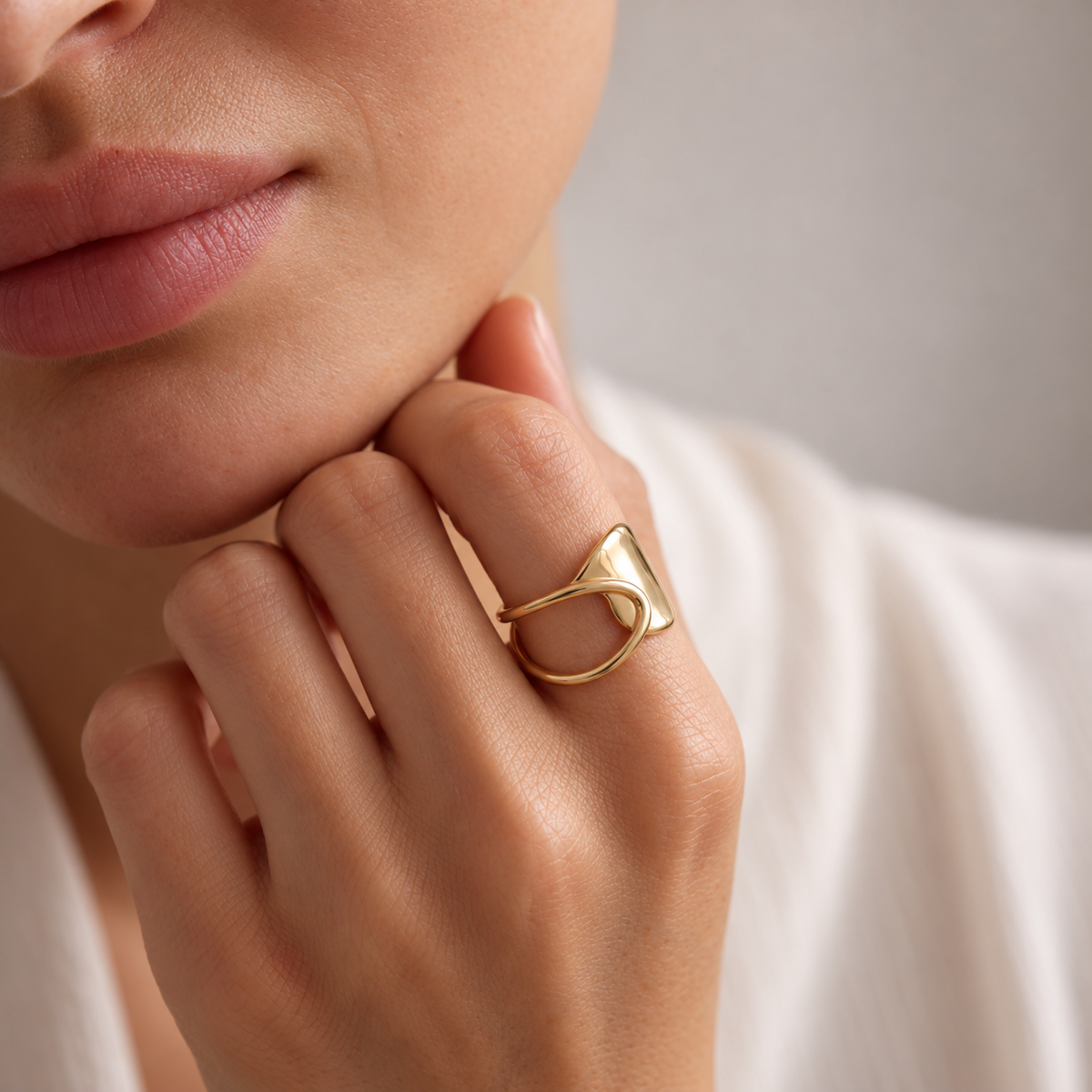 lia crescent ring — editorial photograph, exact catalogue design