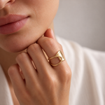 lia crescent ring — editorial photograph, exact catalogue design