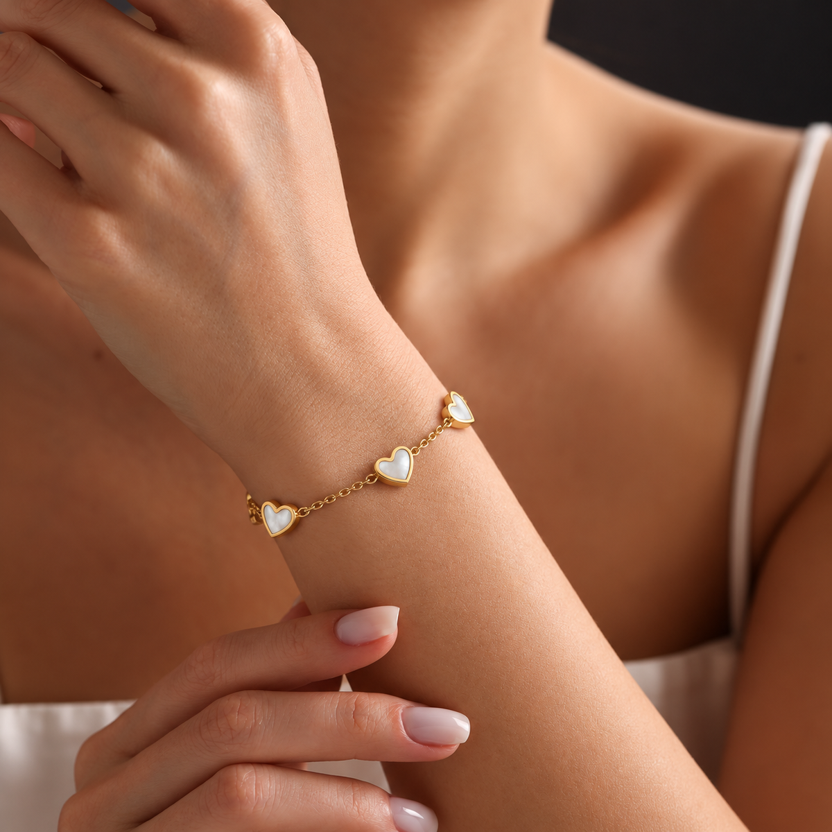 lia heart chain bracelet — editorial photograph, exact catalogue design