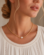 nora pearl necklace — editorial photograph, exact catalogue design