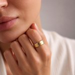 onde cuff ring — editorial photograph, exact catalogue design