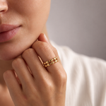 onde double oval ring — editorial photograph, exact catalogue design