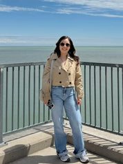 Beige cropped trench jacket styled with straight-leg denim
