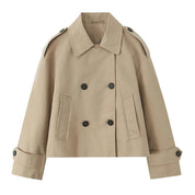 Front view of the beige cropped double-breasted trench jacket