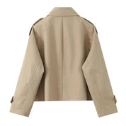 Back view of the beige cropped trench jacket